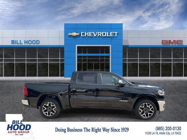 2025 RAM 1500 Laramie in Diamond Black Crystal Pearlcoat — front three-quarter view