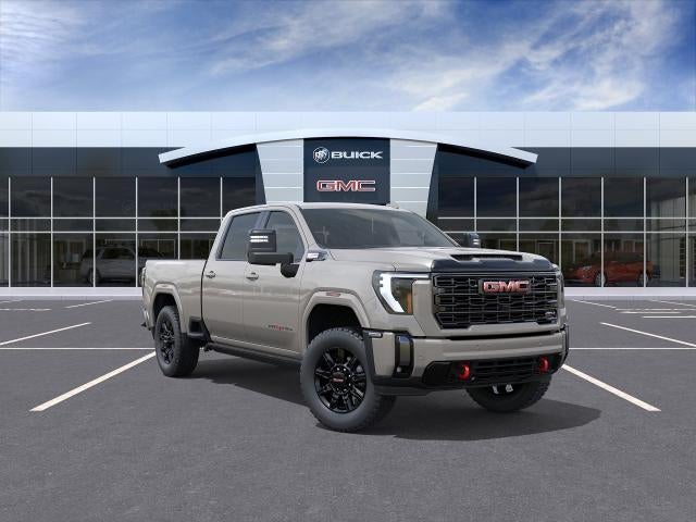2026 GMC Sierra 2500 HD AT4 in Coastal Dune — front three-quarter view