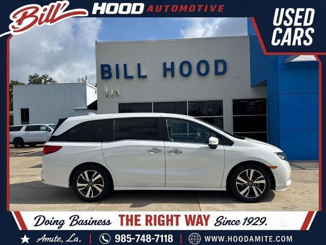 2024 Honda Odyssey Touring in White — front three-quarter view